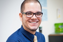 photo of Julio Alicea ’13 in his classroom